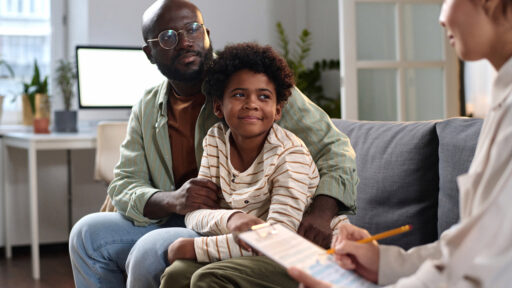dad with kid in therapy