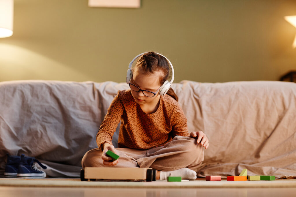 a young girl listening to music