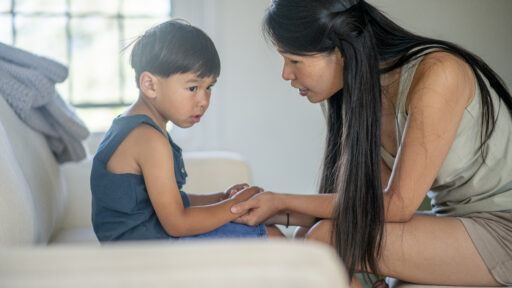 mom talking to her son