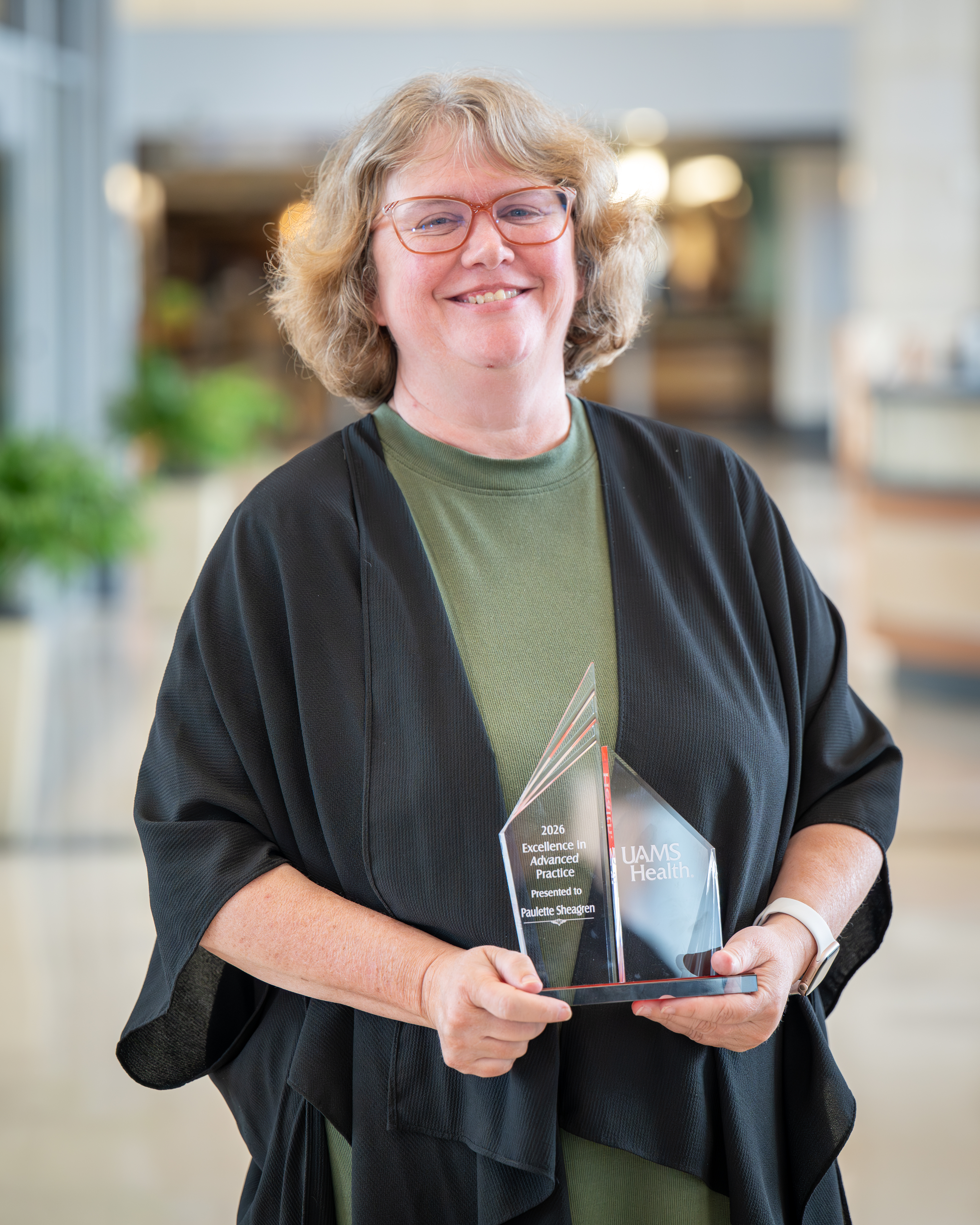 Paulette Sheagren, APRN Behavioral Health with the Excellence in Advanced Practice Award