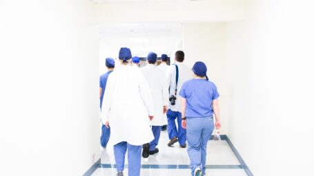 Medical team walking down hallway