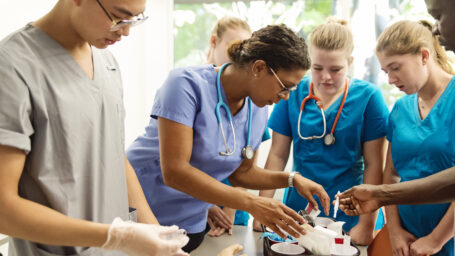 Teens looking at medical supplies