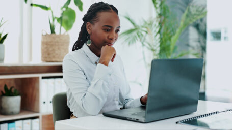 A woman working on a laptop