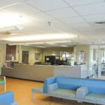 The front desk and waiting room in the James L. Dennis Developmental Center