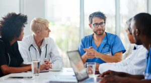 Team of doctors discussing treatment