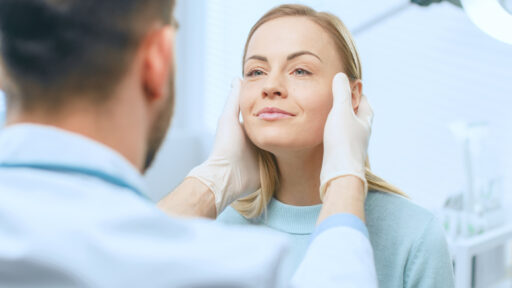 woman receiving plastic surgery consultation