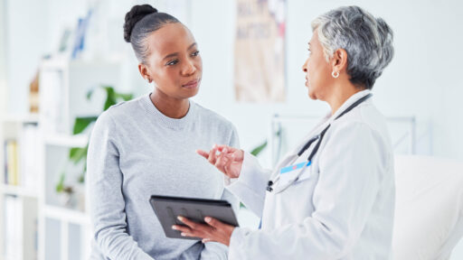 Doctor talking to her patient