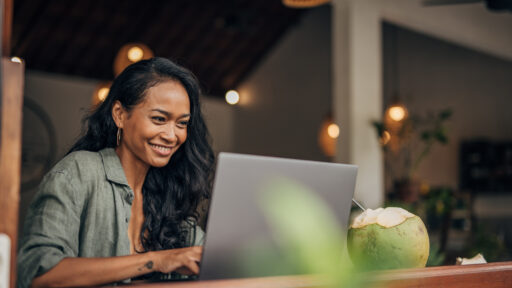 woman looking on her laptop