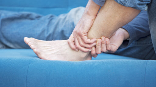 a man experiencing ankle pain