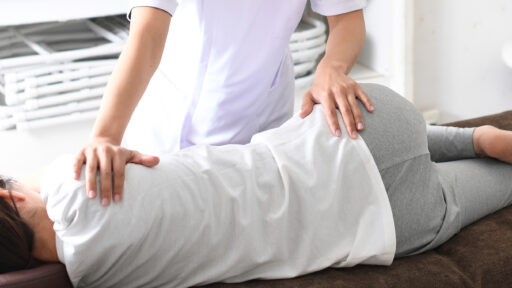 therapist performing pelvic floor therapy