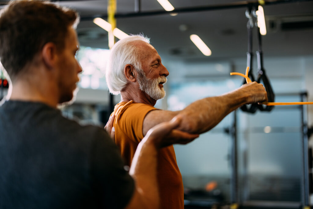 an older man receiving personal training