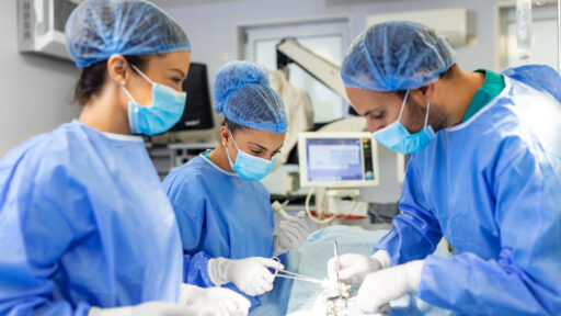 surgeons performing surgery
