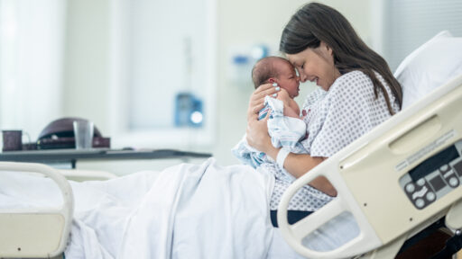 a woman with her baby in the hospital