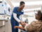 Patient receiving her treatment in the UAMS Baptist Health Infusion Center in Little Rock