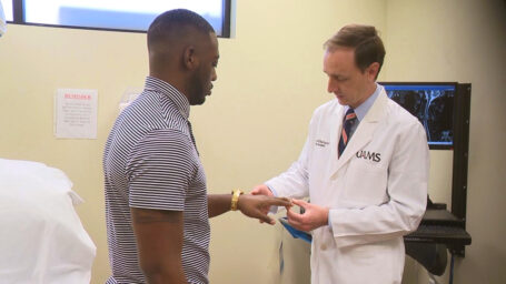 Dr. David Bumpass checks the feeling in Clarence 