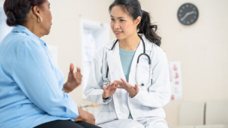 Doctor talking with a patient