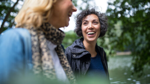 Two middle aged women taking a walk.