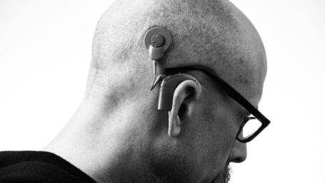 Man with hearing aids.