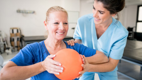 Senior woman in occupational therapy session.
