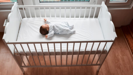 baby sleeping in a crib