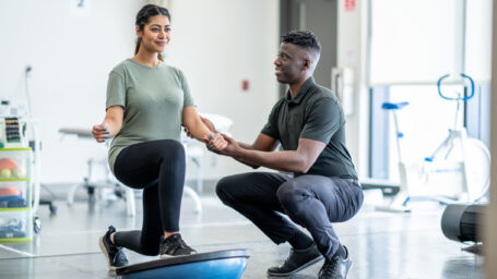 Physical therapist working with a patient