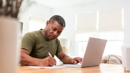 Adult man on the computer